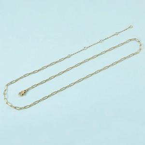 Detail of 14K gold-plated stainless steel paperclip chain with lobster clasp and extender