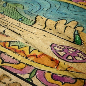 Close-up of bohemian tapestry fabric showing vintage illustration texture and colorful print