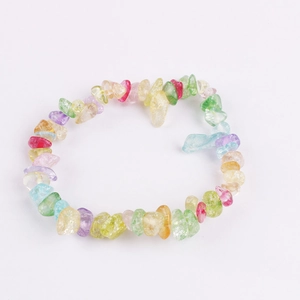 Detailed view of colorful natural stone chips bracelet with translucent crystal texture