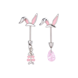 Asymmetric rabbit ear cartilage earrings with pink fishbone and teardrop crystal pendants