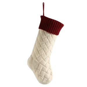 Large 18 inch cream knit Christmas stocking with red cuff and woven diamond pattern