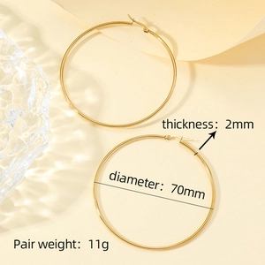 Minimalist 70mm golden stainless steel large hoop earrings with a slim 2mm thick design
