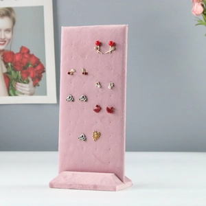 Pink velvet earring display stand with multi-hole design for jewelry organization