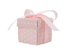 Detail shot of a square pink polka dot gift box with a matching satin ribbon bow closure