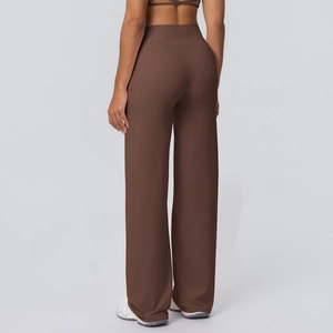 Detail view of high waisted brown flared yoga pants with V-shaped back seam stitching