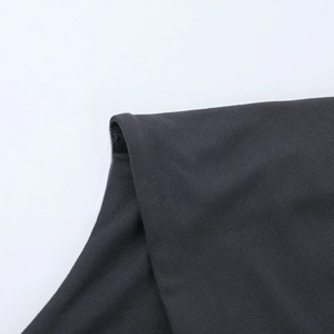 Detailed macro view showing the fine texture and stitching of a dark grey slim-fit top
