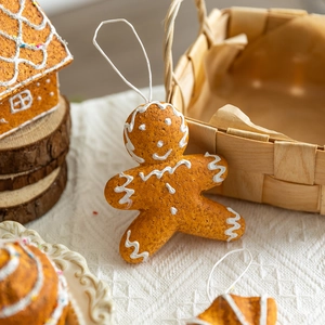 Charming gingerbread man foam ornament with cream icing details for Christmas tree decor