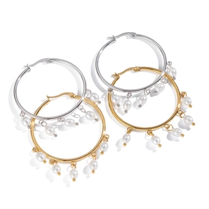 Elegant gold and silver hoop earrings with hanging pearl charms on white background
