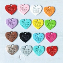 Detailed macro view of heart-shaped colorful charms with engraved Mezzo Piano logo