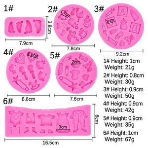 Pink silicone baby mold set for chocolate fondant baking with footprints and bottle shapes