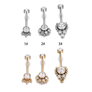 Polished stainless steel belly rings with zircon stones in silver and gold finishes