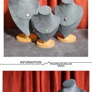 Detailed close-up of necklace styles on jewelry bust stands with velvet texture