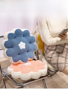 Close-up of thick 3D honeycomb knit fabric on a flower shaped plush seating cushion
