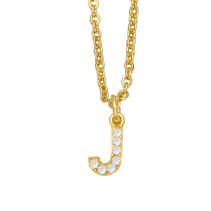 Close-up of a gold-plated letter J pendant with micro-pave set sparkling cubic zirconia stones