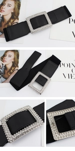 Detail of black elastic wide waist belt with square silver buckle and sparkling rhinestones