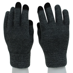Detailed close-up of dark grey knitted gloves with black touchscreen compatible fingertips