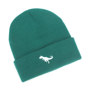 Detailed close-up of dark green knitted beanie featuring a white dinosaur embroidery