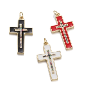 Cross pendants with enamel and colorful zircon in black, red, and white on gold metal