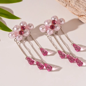 Pink pearl and crystal tassel drop earrings with long silver chains and rhinestone accents