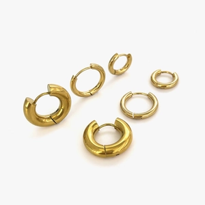 Three-piece set of gold-plated stainless steel huggie hoop earrings in various sizes