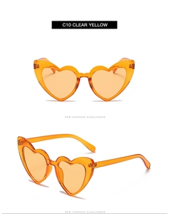 Detailed front and side views of heart-shaped sunglasses in clear yellow tint