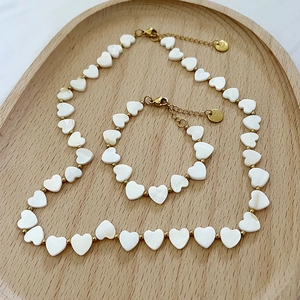 Golden steel beads and white heart shell pendant necklace and bracelet jewelry set