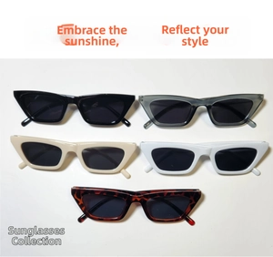 Flat lay of cat-eye sunglasses in five colors including black, beige, and tortoise shell