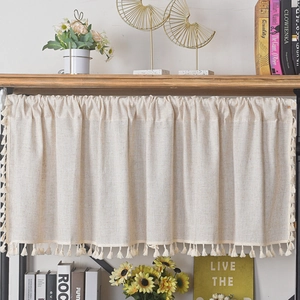 Nordic minimalist beige linen cafe curtain with decorative fringe tassels on a rod