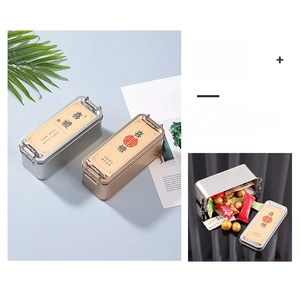 Detail of vintage rectangular tin storage box with metallic buckles for wedding candy