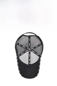 Internal view of black mesh baseball cap showing reinforced seams and breathable fabric