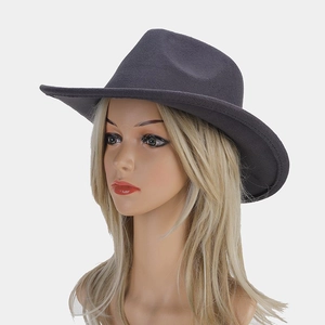 Detail of the wide brim dark gray wool felt hat showing texture and structure on a model