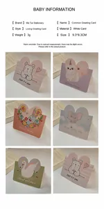 Close-up of cute cartoon heart-shaped greeting cards with various animal illustrations