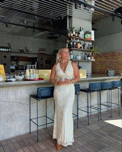 Close-up of floral lace texture on V-neck backless slim-fit sleeveless maxi dress