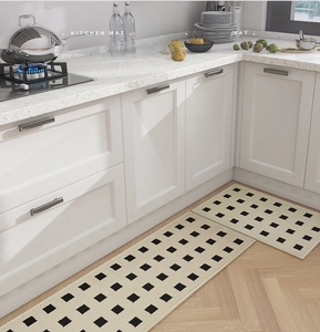 Modern kitchen mat set with beige and black geometric pattern on woven non-slip surface