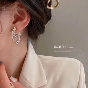 Elegant silver crisscross stud earrings featuring sparkling pavé crystals for women