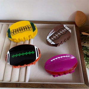 Lot de 4 pinces à cheveux géométriques en forme de rugby jaune marron noir rose