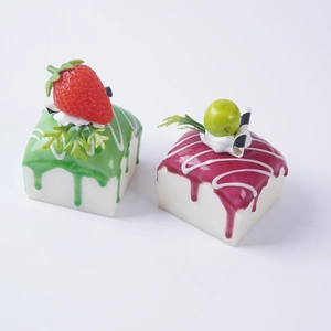 Realistic square PU cream cake models with strawberry and grape toppings on white background