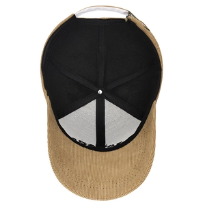 Inside view of a khaki corduroy baseball cap with soft lining and adjustable metal buckle
