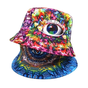 Colorful bucket hats with eye patterns and psychedelic prints on white background
