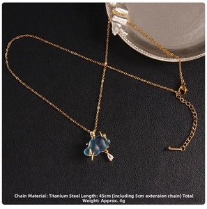 Detailed view of titanium steel cloud necklace with golden lightning and teardrop pendant