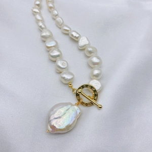 Elegant baroque freshwater pearl necklace with gold OT clasp and large pearl pendant