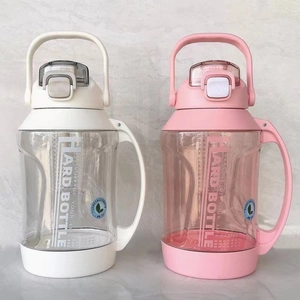 High-capacity sports water bottles in pink and white with handle and straw