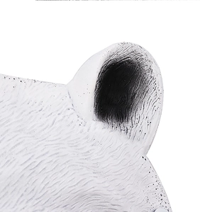 Detailed macro view of white 3D animal mask showing realistic fur texture and ear structure
