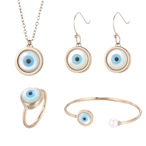Rose gold Evil Eye jewelry set with necklace, earrings, ring, and pearl bracelet