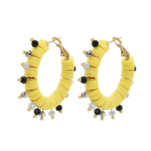 Boucles d'oreilles créoles en perles Heishi jaunes et cristal au style bohème