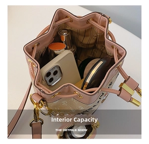 Detail view of pink Snoopy bucket bag showing spacious interior capacity for cosmetics