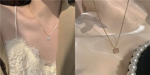 Detail of square mother-of-pearl pendant on a gold chain necklace for women