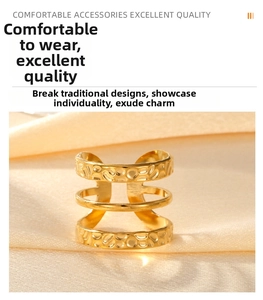 Detailed macro shot of vintage gold-plated triple-layer hammered texture open ring