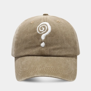 Close-up of vintage khaki washed cotton baseball cap with white spiral question mark embroidery