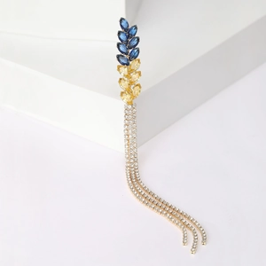 Detail of wheat ear brooch with blue and gold crystals and sparkling rhinestone tassels